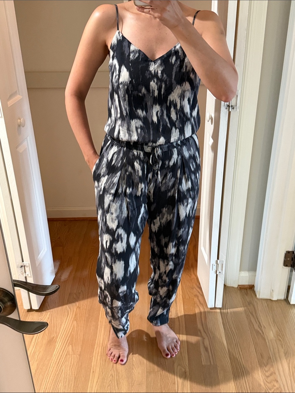 Haute Hippie Black and White V-Neck Strap Jumpsuit.  Size S